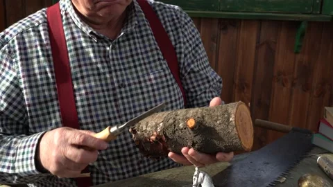 Creating Pinocchio in a carpenter's workshop . Stock Footage 147142957