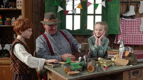 Creating Pinocchio in a carpenter's workshop . Stock Footage 147142989