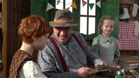 Creating Pinocchio in a carpenter's workshop . Stock Footage 147143017