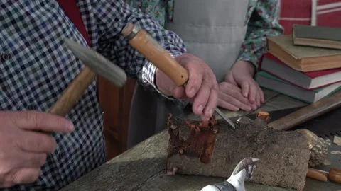 Creating Pinocchio in a carpenter's workshop . Stock Footage 147143034