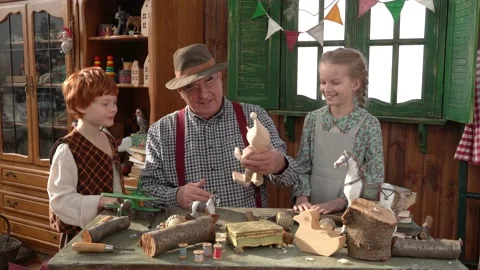 Creating Pinocchio in a carpenter's workshop . Stock Footage 147143054