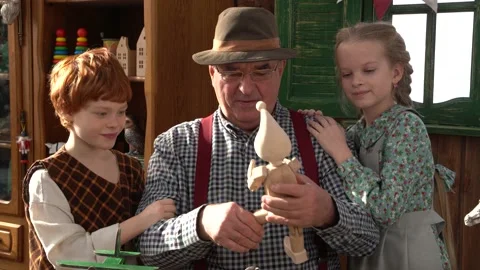 Creating Pinocchio in a carpenter's workshop . Stock Footage 147143077