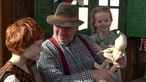 Creating Pinocchio in a carpenter's workshop . Stock Footage 147143115