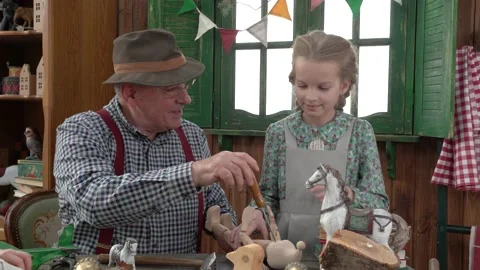 Creating Pinocchio in a carpenter's workshop . Stock Footage 147143286