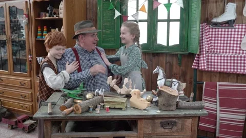 Creating Pinocchio in a carpenter's workshop . Stock Footage 147143313