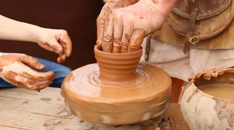 Creating a pot on a potter's wheel. Stock Footage 62112710