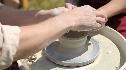 Creating a pot on a potter's wheel Stock-Footage 66276127