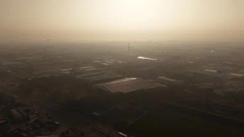 The creating a powerful visual contrast between industrial pollution and green 스톡 동영상 334194306