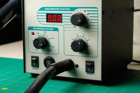 Creating precise connections with a rework station for electronics projects Stock Photos