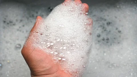 Creating a relaxing bubble bath for self-care and wellness Stock Footage 309357796