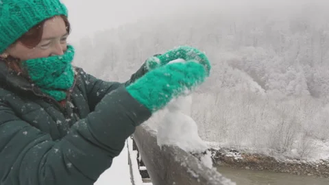 Creating a Snowman can be a delightful winter activity that brings joy and Stock-Footage 317030130
