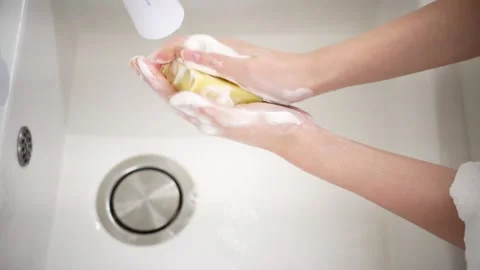 Creating Soap Lather by Hand at Bathroom Sink 動画素材 334829567