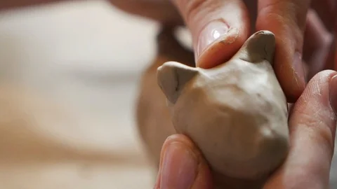 Creating toys from clay Stock Footage 102306347