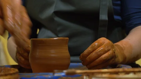 Creating vase of white clay close-up. The sculptor in workshop makes jug out of  스톡 동영상 99773403