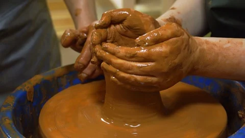 Creating vase of white clay close-up. The sculptor in workshop makes jug out of  Stock Footage 99773620