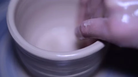 Creating vase of white clay close-up macro slow motion Stock Footage 148265150