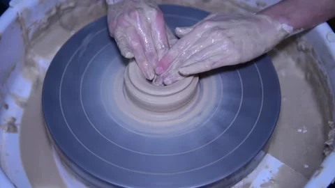 Creating vase of white clay slow motion Stock Footage 148264948