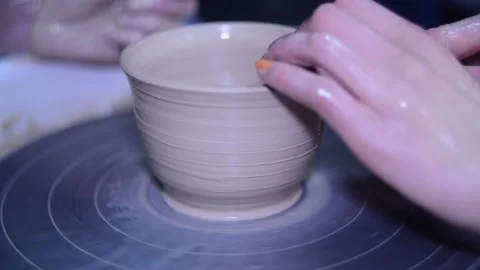 Creating vase of white clay slow motion Stock Footage 148264987