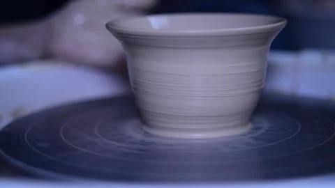 Creating vase of white clay slow motion Stock Footage 148265038