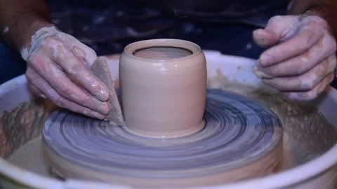 Creating vase of white clay slow motion Stock Footage 148265069