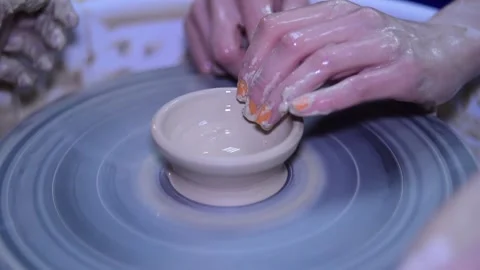Creating vase of white clay slow motion Stock Footage 148265097