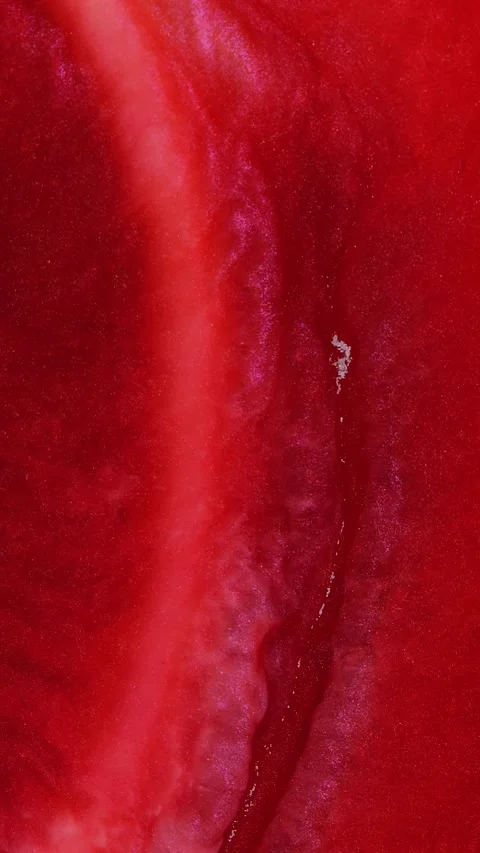 Creating vibrant alcohol ink abstract art with deep red hues and intricate Stock Footage 291382585