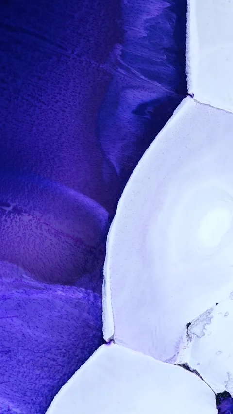 Creating vibrant alcohol ink abstract art with shades of blue and white in a Stock Footage 293251004