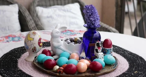 Creating vibrant Easter eggs with unique designs and color painting for a Stock Footage 306066297