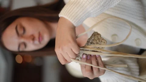 Creating a Warm and Inviting Handcrafted Accessory with a Personal Touch  Stock Footage 302193316