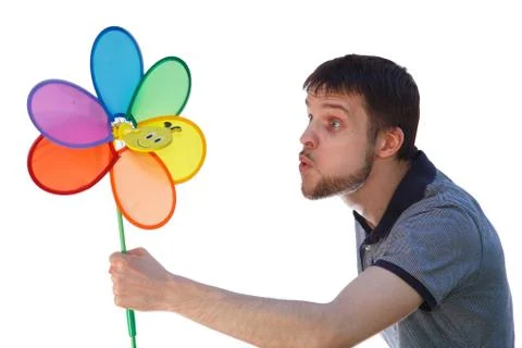 Creating wind by blowing hard Stock Photos