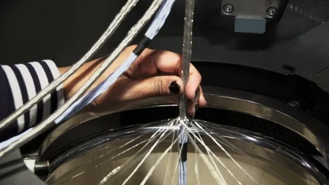 Creating wires on machinery 4 Stock Footage 92343677