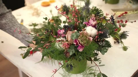 Creating a wonderful composition of cotton, cones, fir, magical variety Stock Footage 58889993