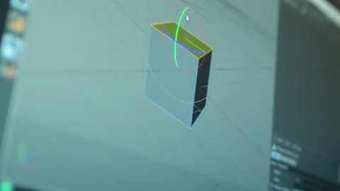 Creation of a 3D object in a professional 3D program. Rotating a 3D cube in Stock Footage 139804566