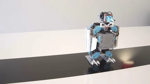 Creation and programming for dancing robot penguin Stock Footage 77422338