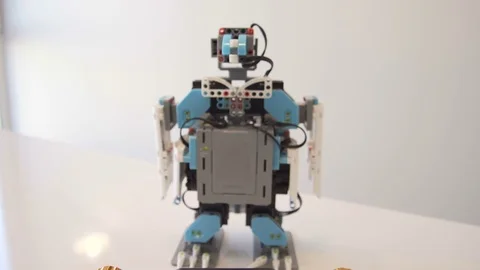 Creation and programming for dancing robot penguin Stock Footage 77423265