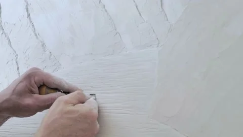 Creation of decorative panels on the wall Stock Footage 133632617