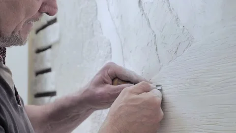 Creation of decorative panels on the wall Stock Footage 133633454