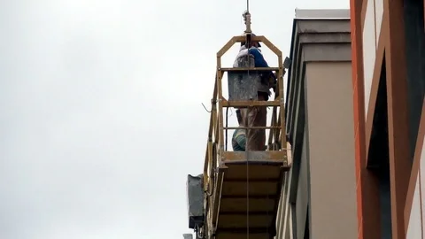 Creation facade for the building under construction Stock Footage 91320308