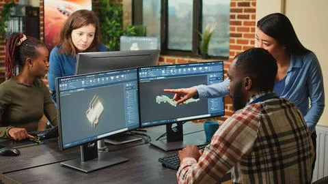 Creative 3d engineers designing mechanical clamp on manufacturing cad software Stock Photos