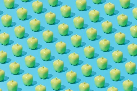 Creative abstract apple pattern flat lay on pastel blue background minimalism Stock Photos