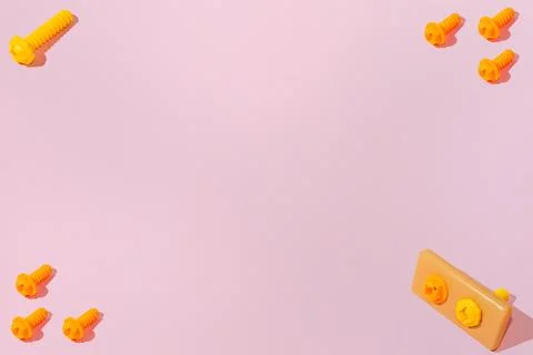Creative abstract build tools pattern flat lay on pink background copy space Foto stock