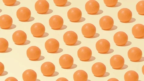 Creative abstract orange pattern flat lay on pastel yellow background minimalism Stock Footage 331715108