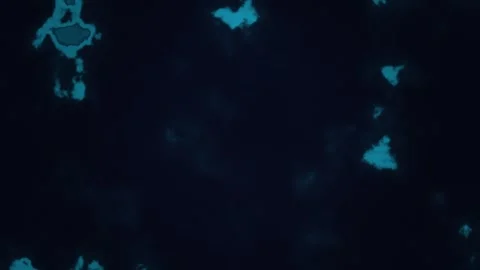 Creative abstract shapes appear in dark background footage Stockbeeldmateriaal 338040731