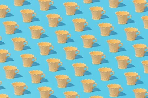 Creative abstract tableware dish crockery pattern flat lay on blue background Foto stock