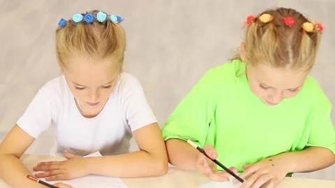 Creative afternoon of drawing and fun with friends in a bright room Stock-Footage 296332344