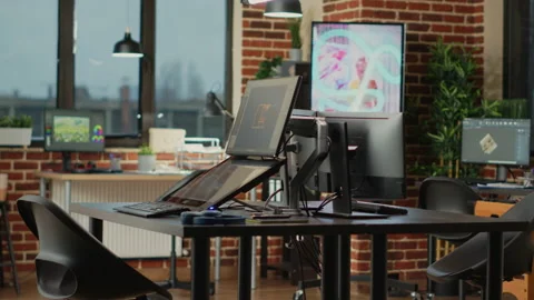 Creative agency modern office with multiple monitors to work on professional Video stock 232070323