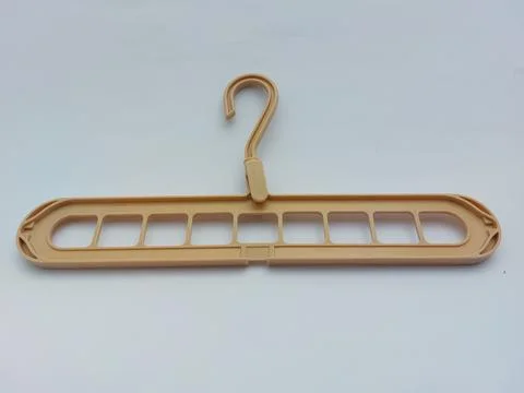 Creative and efficient clothes hanger Stock Photos