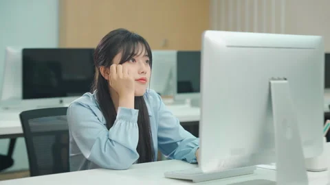 Creative and idea crisis, boring young businesswoman having long work day on Stock Footage 336759056