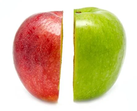 The creative apple combined from two half of red and green Stock Photos