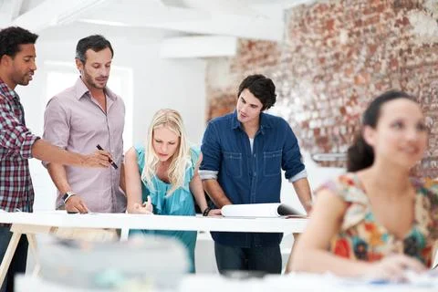Creative, architect and team with floor plan in office, discussion and real.. Stock-Fotos